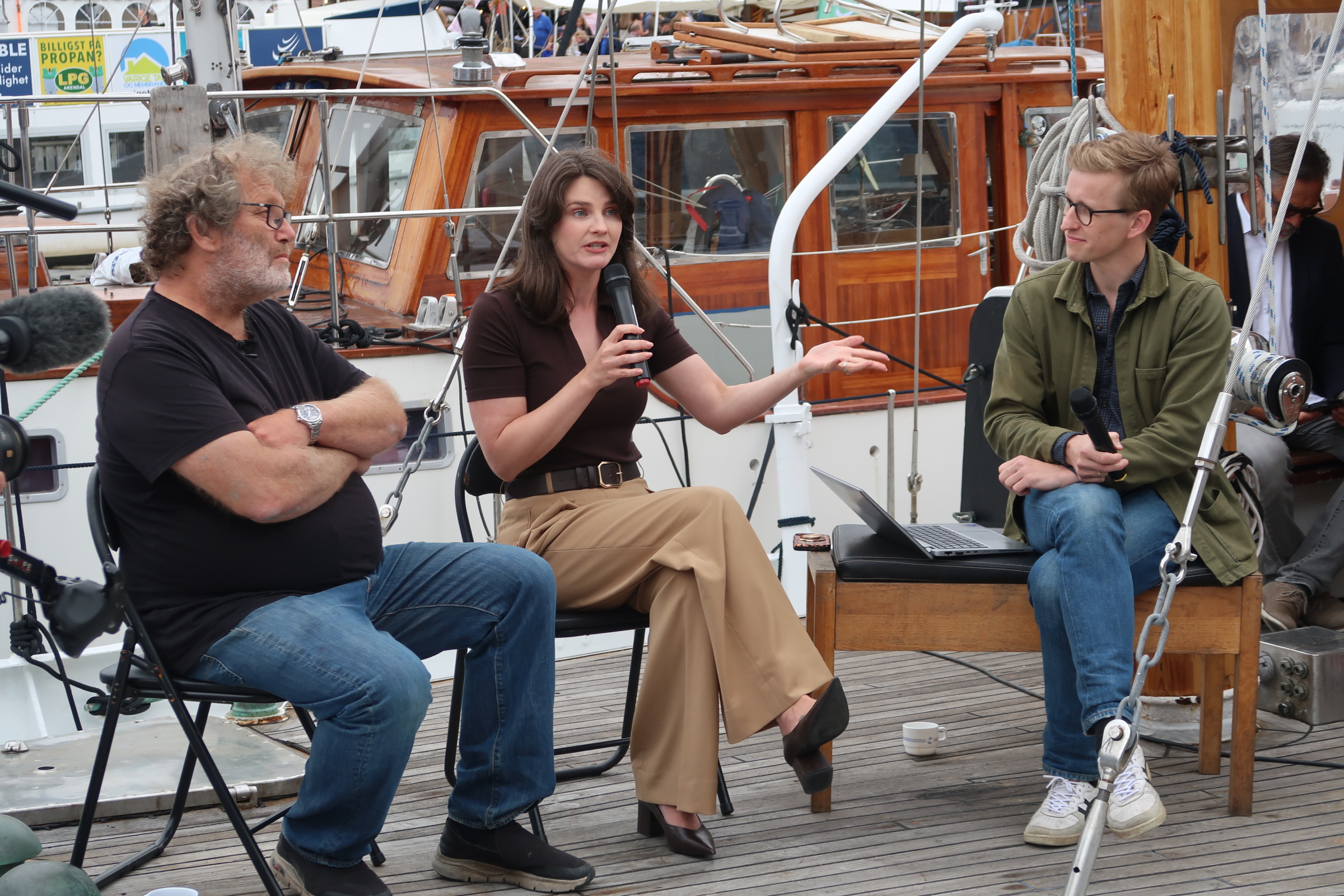  

Frederic Hauge, left, and Nina Jankowicz speak at an event with Christian Eriksen Bellona’s head of policy and research.  